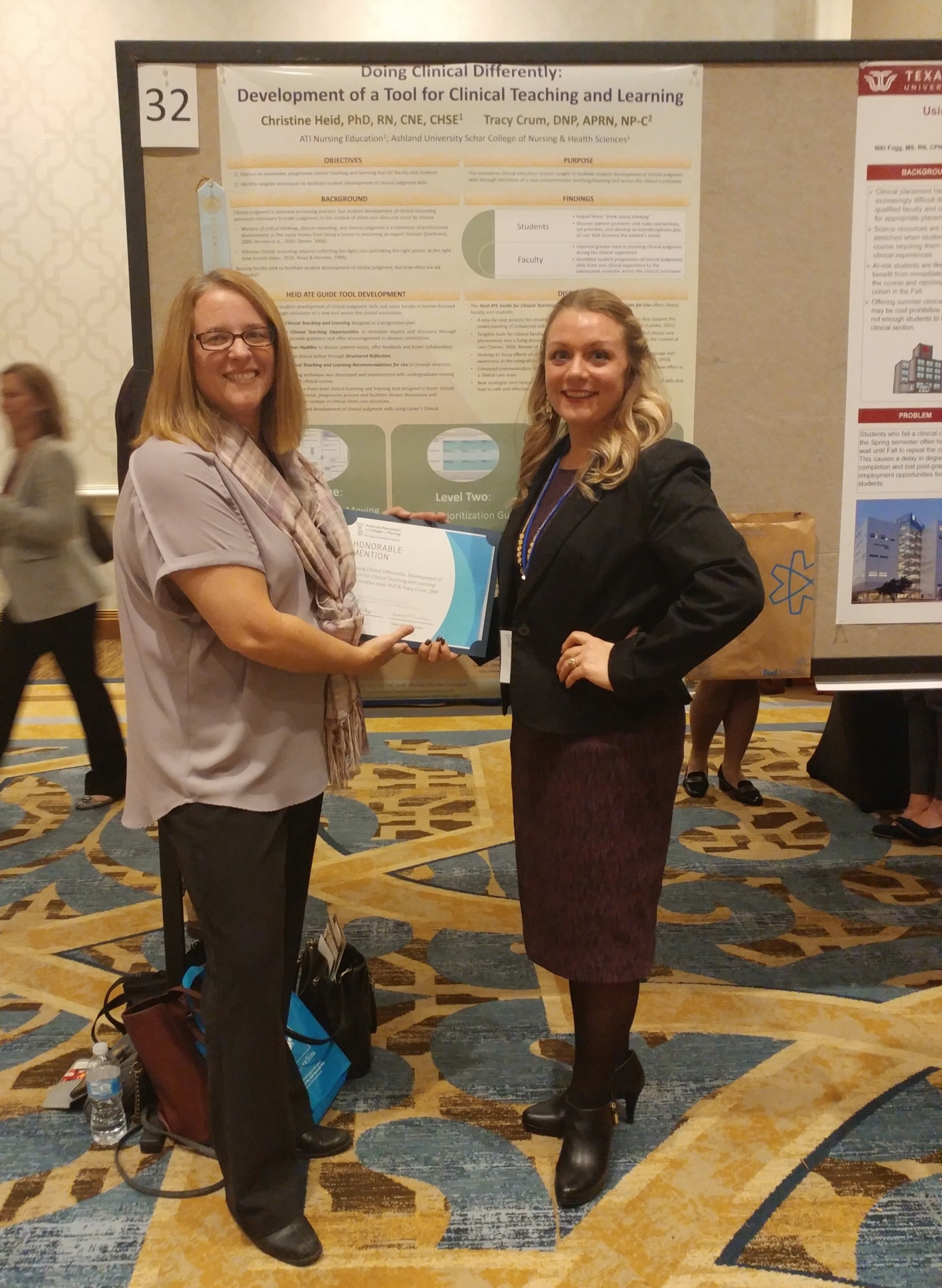 Christy Heid and Tracy Crum hold certificate