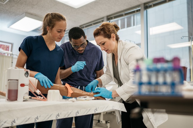 Students in sim lab